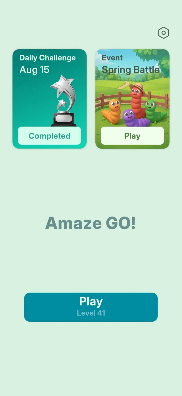 The Amaze GO! home screen — a completed Daily Challenge card, a Spring Battle event with four colourful caterpillar characters, and a Play button showing Level 41